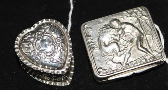 A 19th century French cast silver snuff box the cover decorated with Hercules and the Nemean lion and a Victorian heart shaped pill box